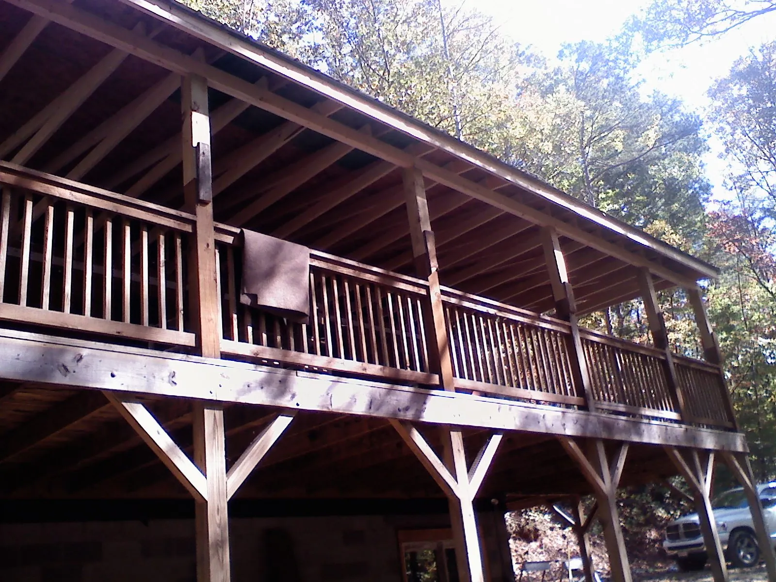 Timber framing under a new elevated porch and deck — Roof Leak Repair in Faulkner by Roofing Brothers
